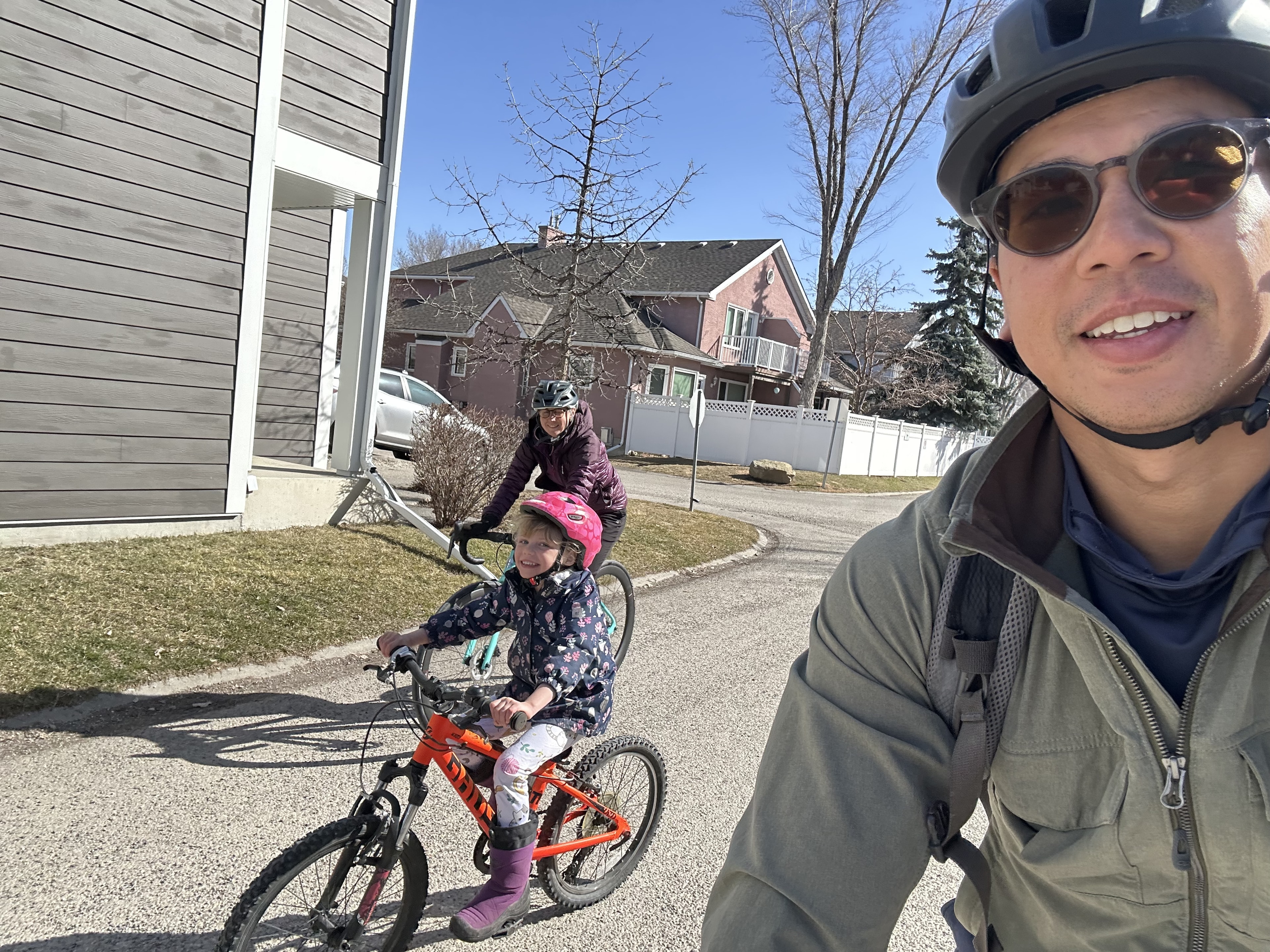 Community members cycling together on an urban street